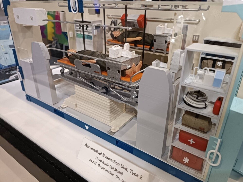 A model of the interior of ALAE Engineering's aeromedical evacuation unit is shown off at trading company Jupitor Corporation's booth at the Singapore Airshow on Wednesday.